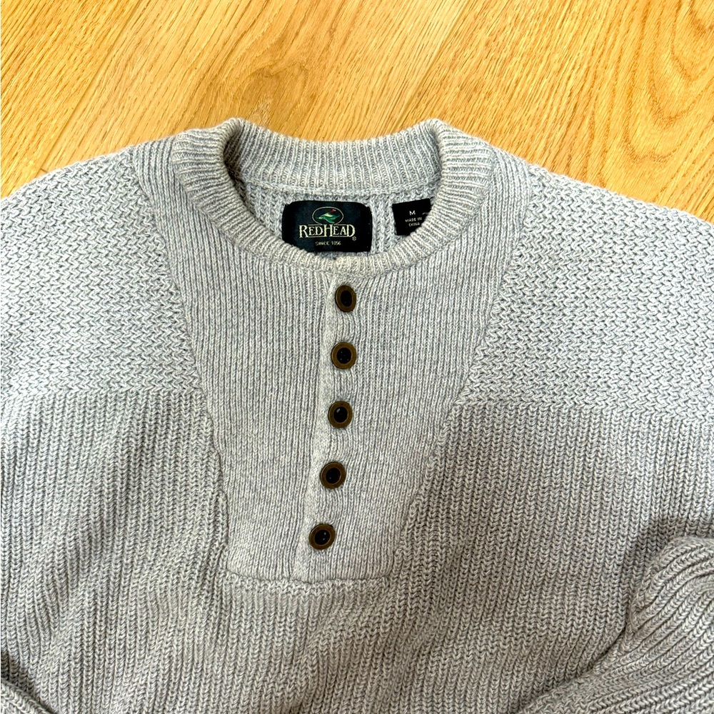 Men’s M long sleeve sweater with  buttons.  Redhead never worn.